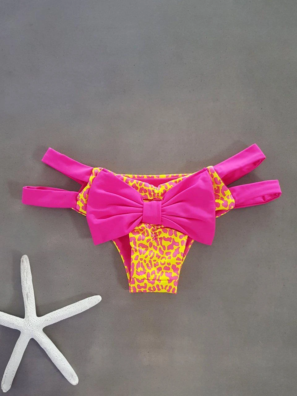 Dollboxx Cheeky Bow Brazilian Bikini Bottom - Savage Yellow/Pink 1 Dollboxx Cheeky Bow Brazilian Bikini Bottom - Savage Yellow/Pink